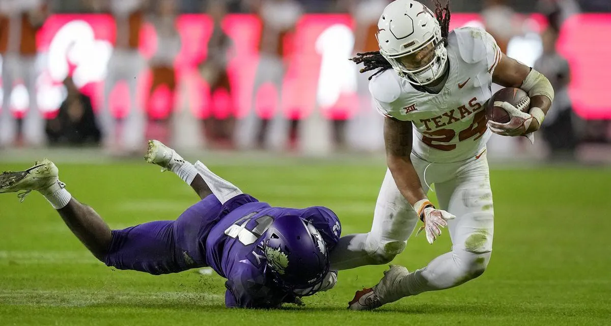 Texas RB Brooks out for the year with torn ACL